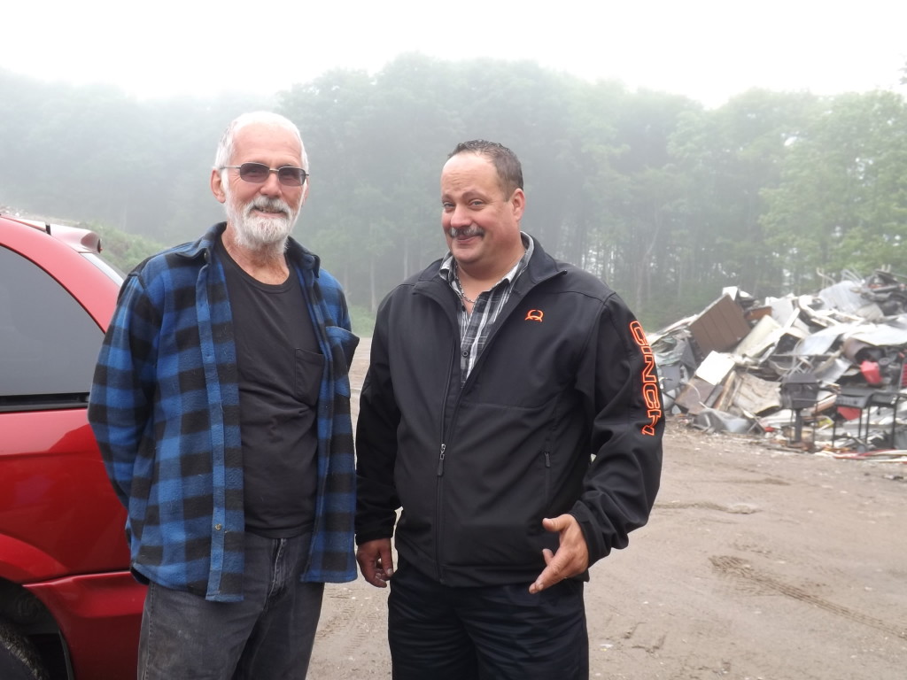 Jim Lipsit and Greg Long. Lipsit is the Havilland Waste Site operations manager. "We try to keep as much as possible out of the landfill. We pull out tires and the metals. We have a resuse store too- whatever doesn't go in the landfill is a good thing. There's a lot less coming into the landfill with Greg's business picking up curbside recycling."