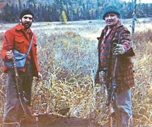 Robert and Leonard with a moose- Leonard would never wear his good hunting clothes on a hunt.