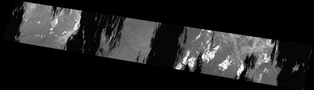 Example of an infrared scan imagery of the Fort McMurray wildfire. Black areas are cloud while white areas are hot. The image was taken during the day and the flame front was actively moving. Dr. Johnston and crew flew the same spot twice a few minutes later and they were able to map the change in the flame front location. Photo Courtesy of Natural Resources Canada