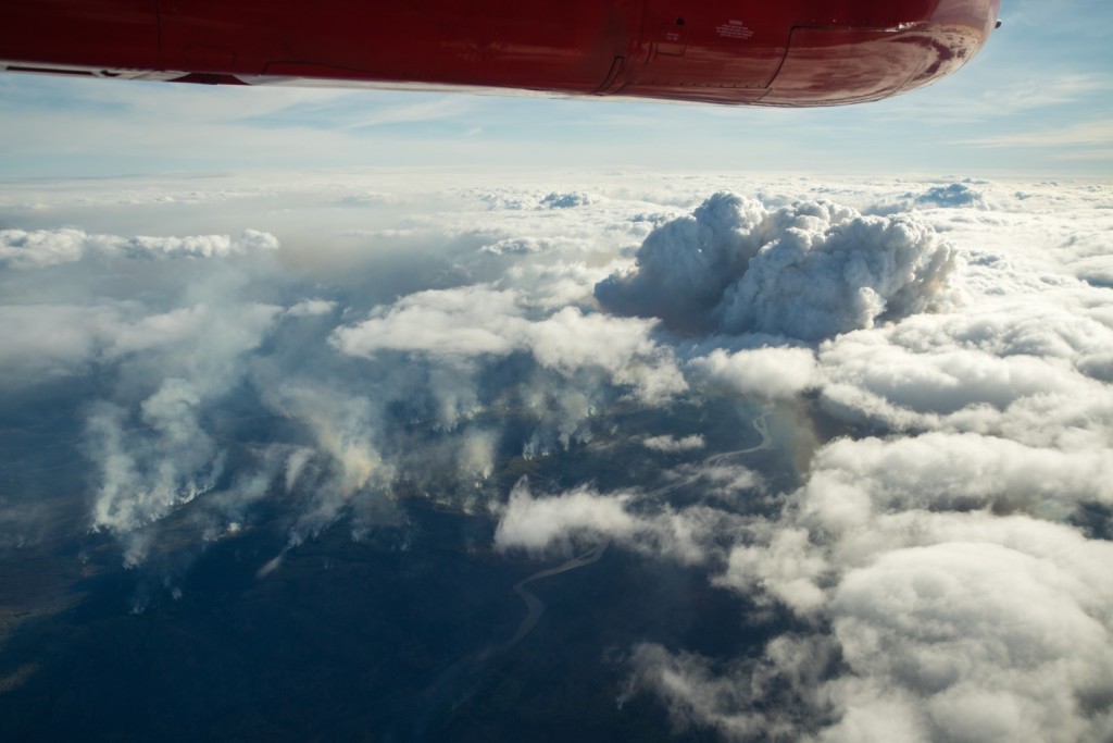 Smoke cloud shown above Fort McMurray, Alberta, May 2016. Photo Credit: Bo Lu, Natural Resources Canada, Northern Forestry Centre